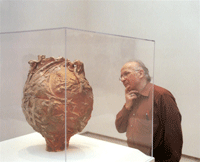 Roald Hoffman contemplates a vessel by Don Reitz